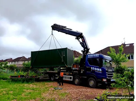 HIAB crane delivering a shipping container in the UK
