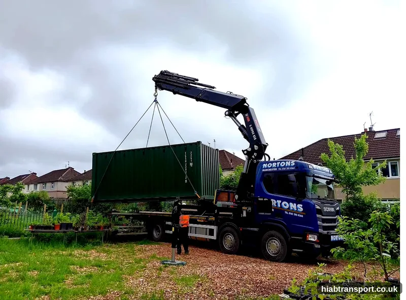 HIAB crane delivering a shipping container in the UK